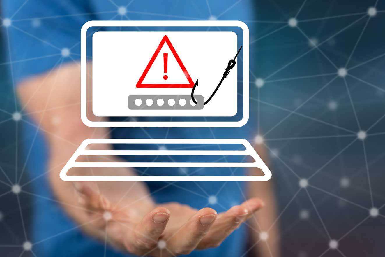 Hammeçon accrochant un panneau attention sur un ordinateur