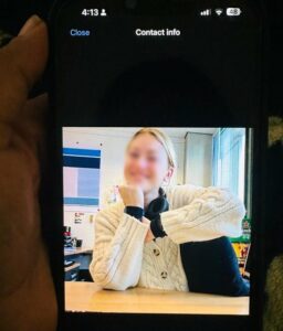 Woman sitting at her desk having a video call.